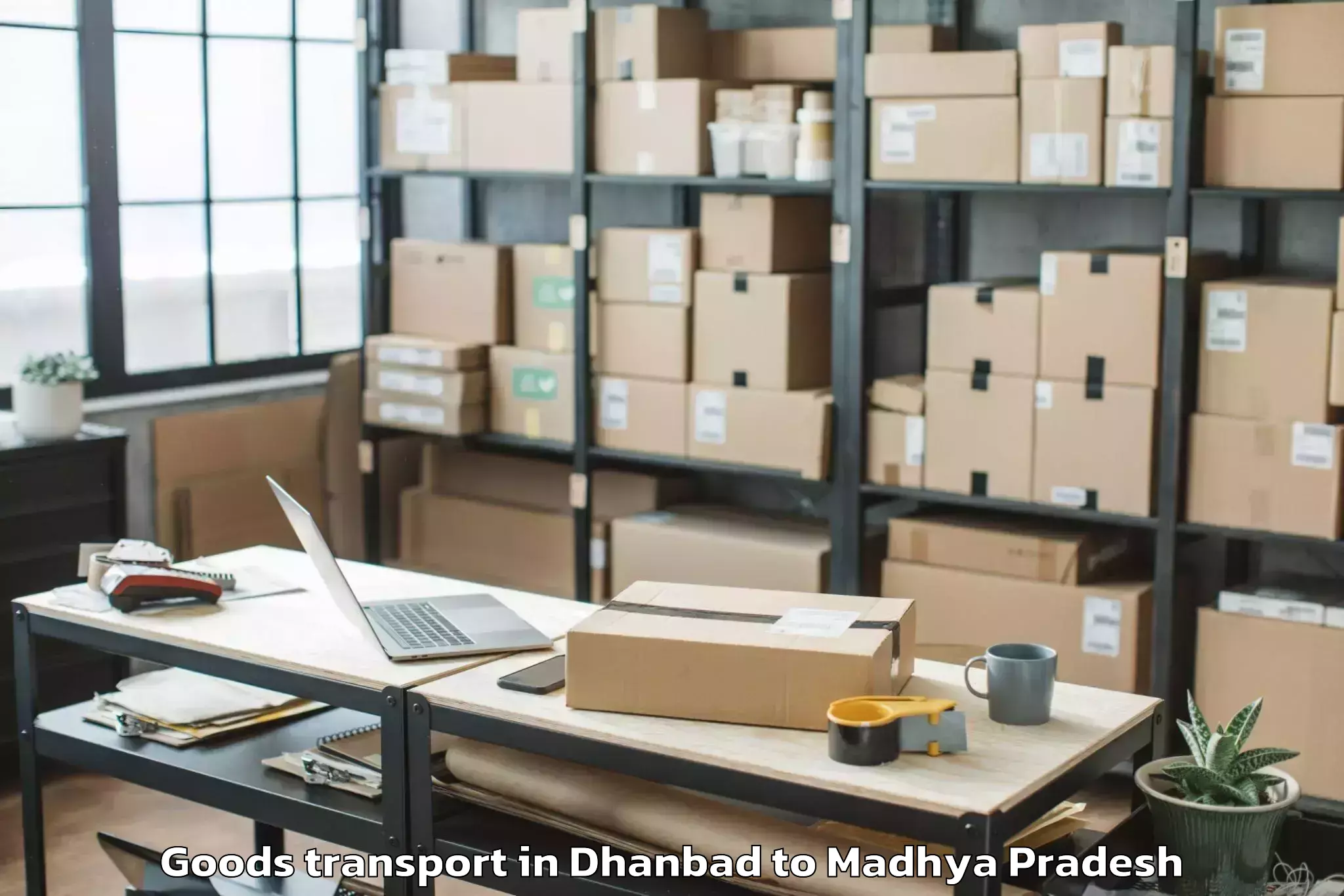 Easy Dhanbad to Dhamnod Goods Transport Booking